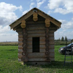 Дачный туалет из бревна